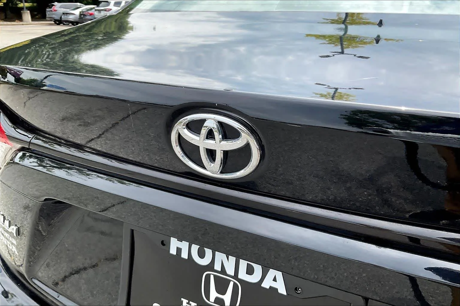 Used 2024 Midnight Black Metallic Toyota LE image 10