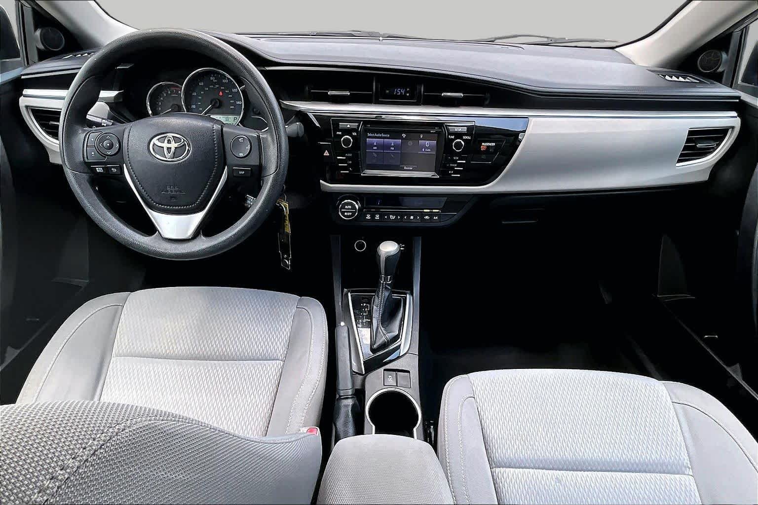 Used 2016 Classic Silver Metallic Toyota LE image 15