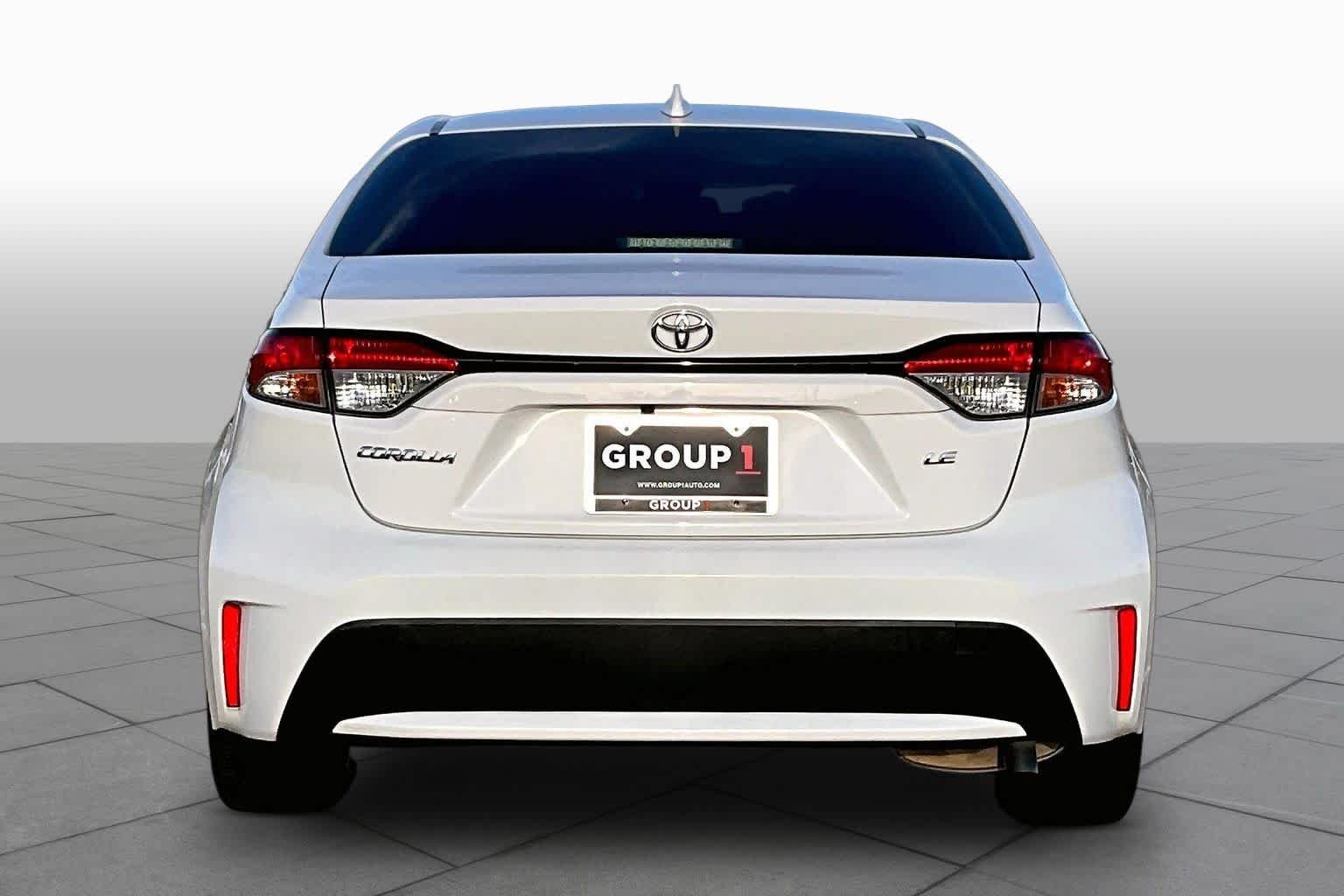Used 2021 Super White Toyota LE image 5