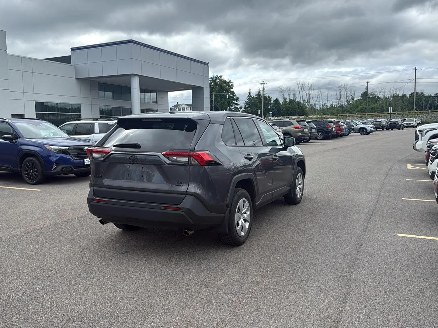 Used 2024 Magnetic Gray Metallic Toyota LE image 6
