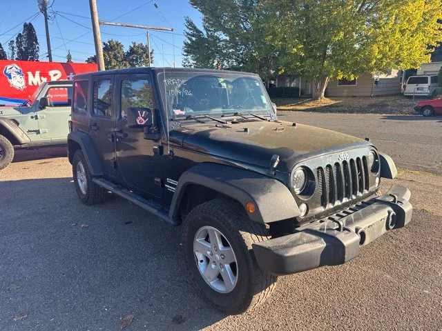 Used 2014 Black Clearcoat Jeep Sport image 1
