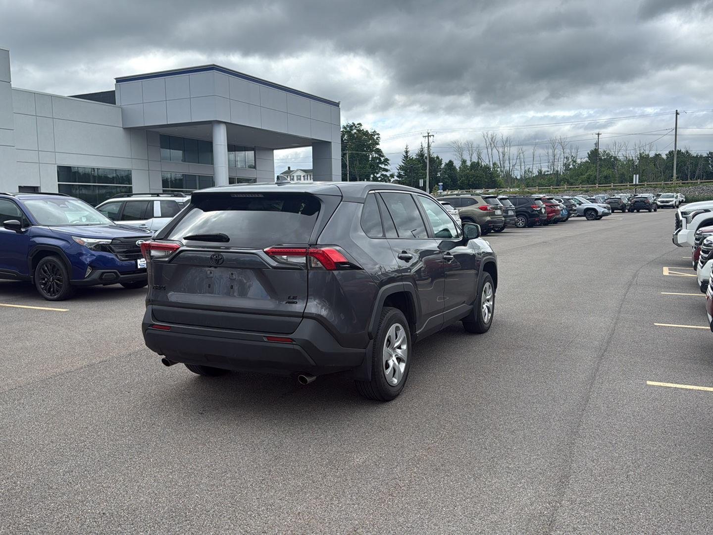 Used 2024 Magnetic Gray Metallic Toyota LE image 6