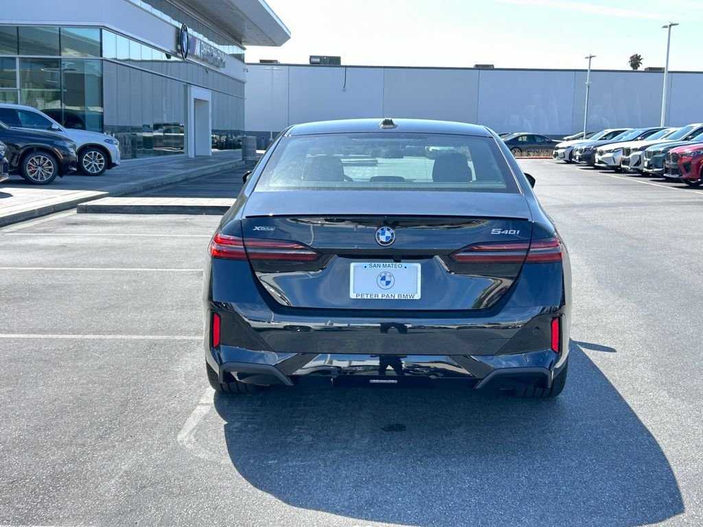 New 2027 Black Sapphire Metallic BMW 540i xDrive image 4