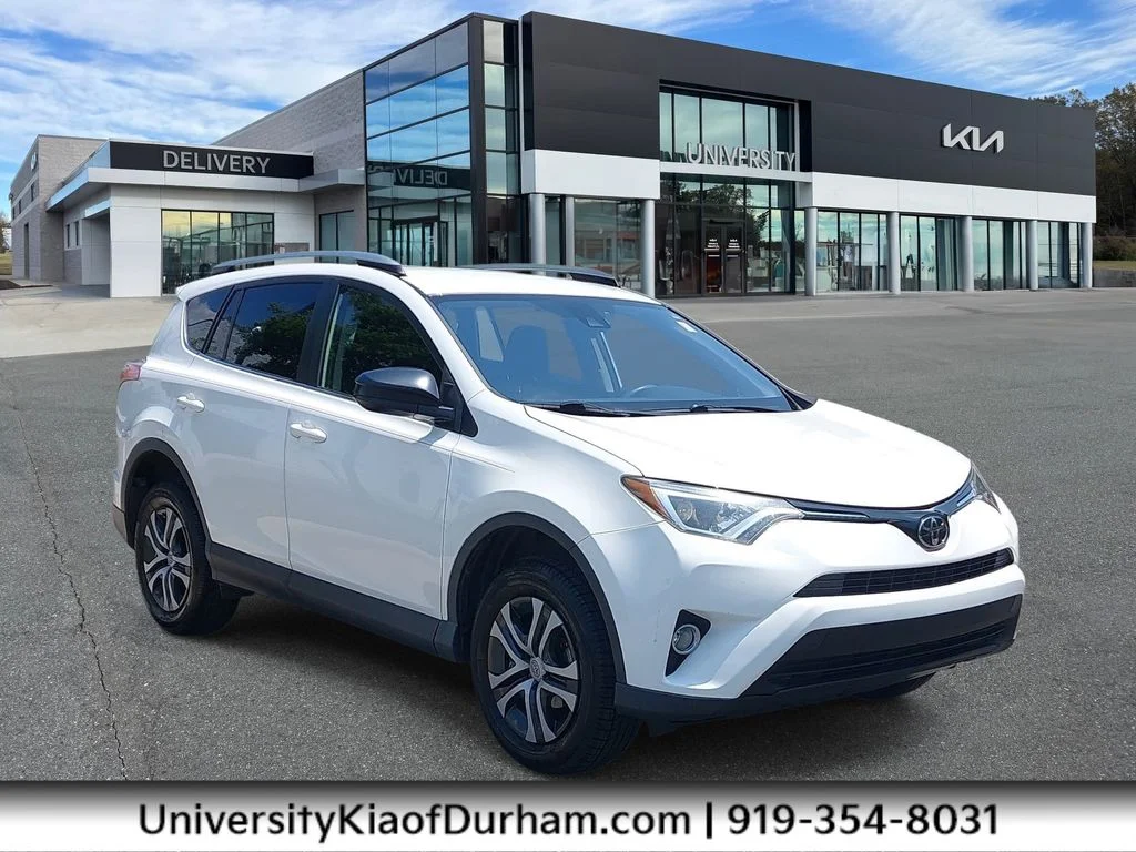 Used 2018 White Toyota LE image 1