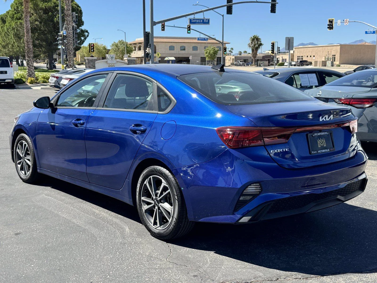 Used 2024 Deep Sea Blue Kia LXS image 4