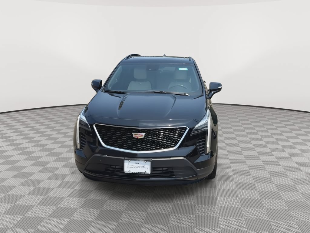 Used 2022 Stellar Black Metallic Cadillac Sport image 4
