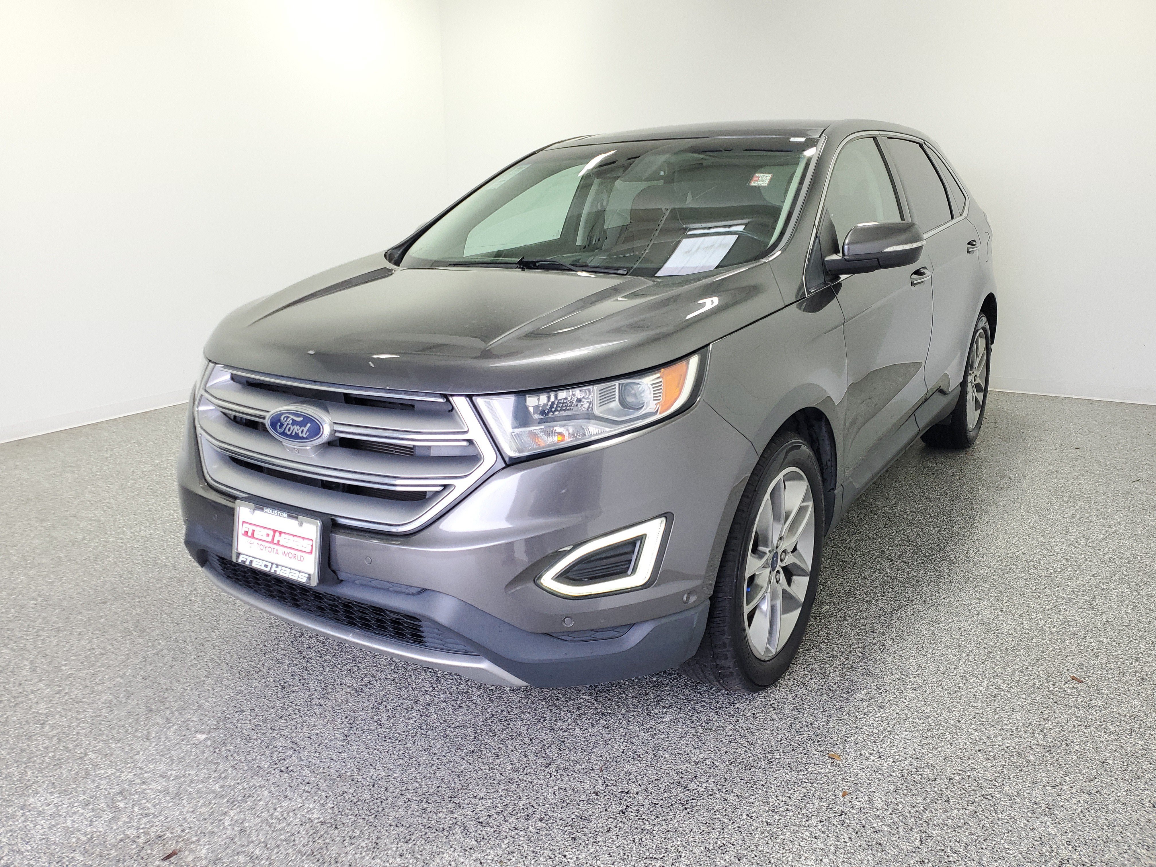 Used 2015 Magnetic Metallic Ford Titanium image 2