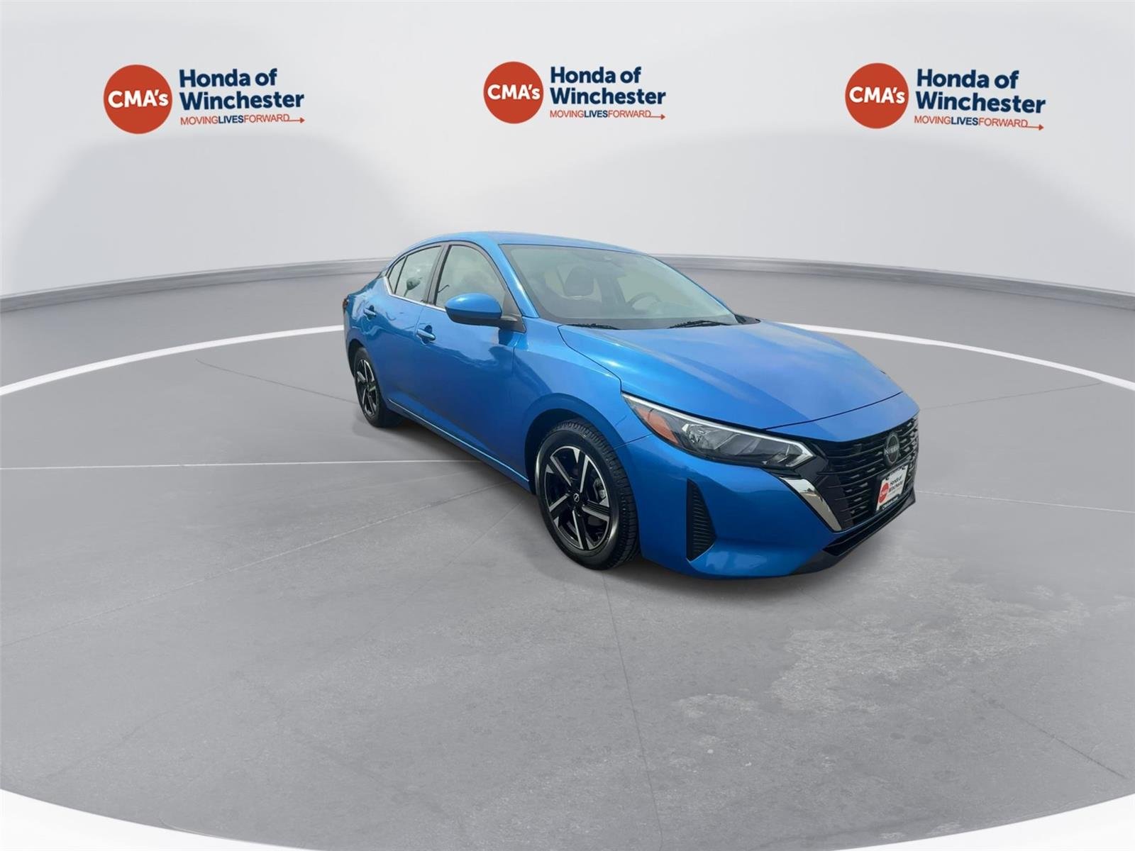 Used 2025 Electric Blue Metallic Nissan SV image 2