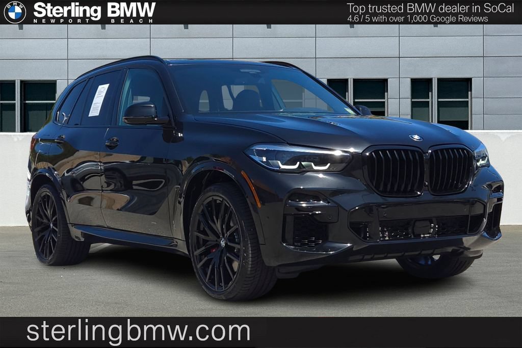Used 2023 Black Sapphire Metallic BMW sDrive40i image 1