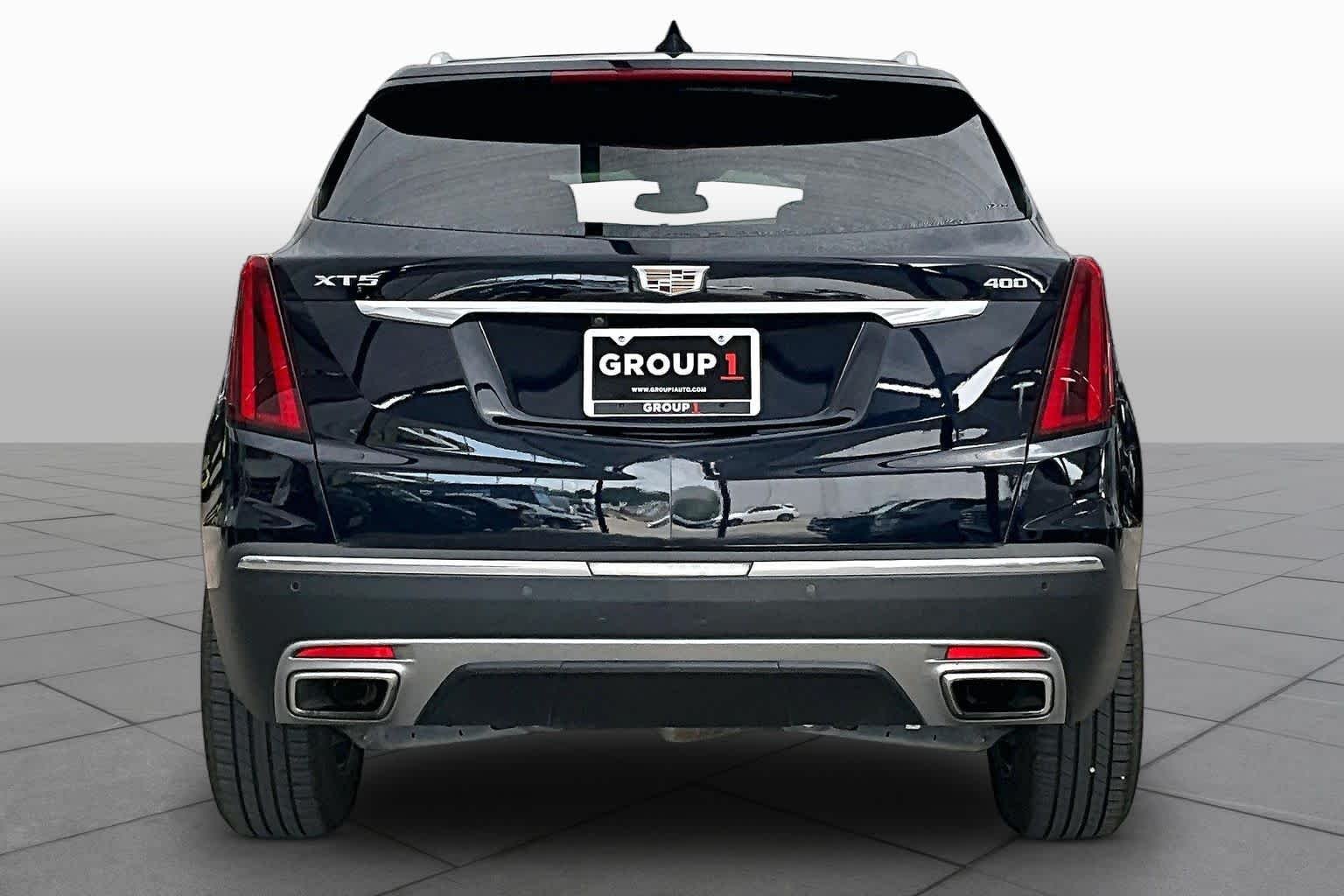 Used 2021 Dark Moon Blue Metallic Cadillac FWD Premium Luxury image 5