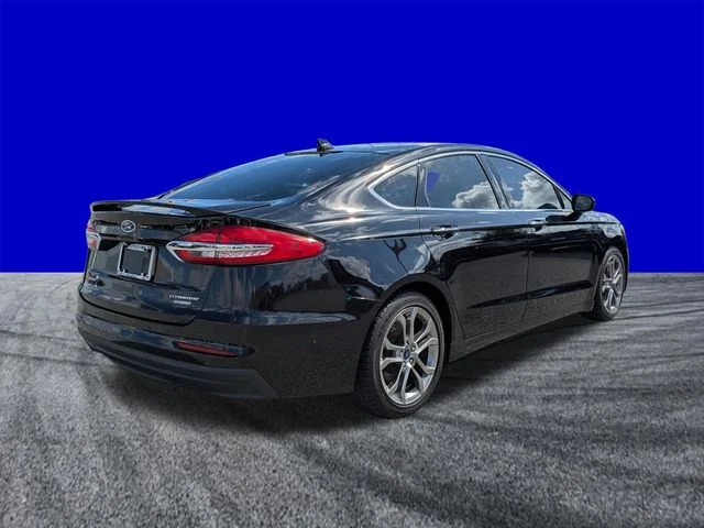 Certified Used 2020 Agate Black Metallic Ford Titanium image 4