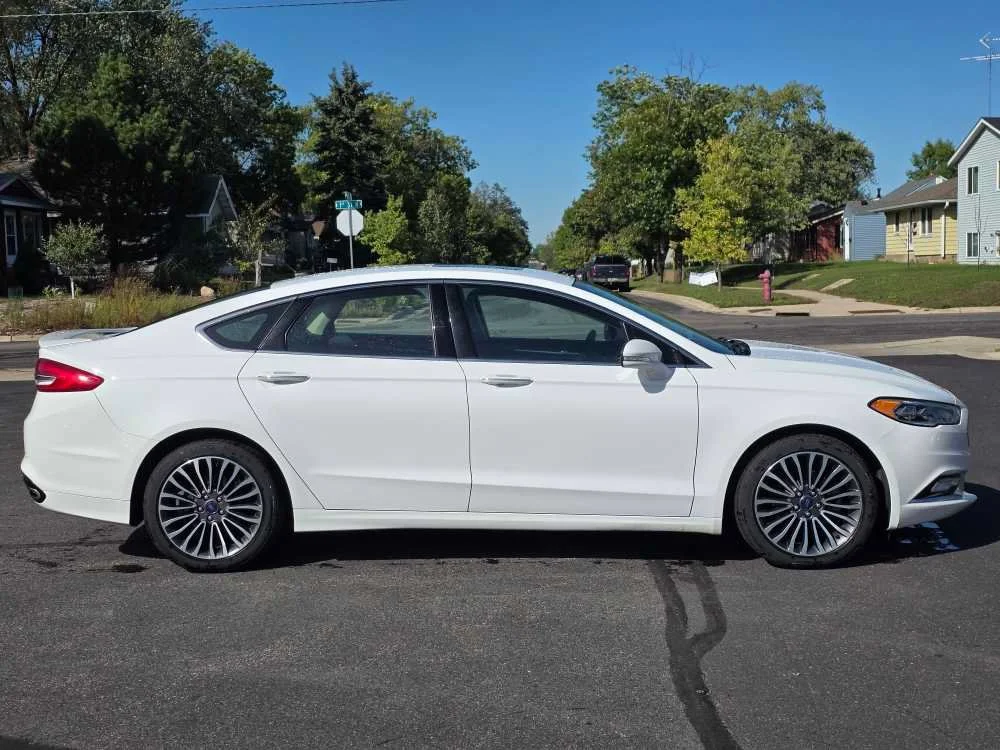 Used 2018 Oxford White Ford Titanium image 1