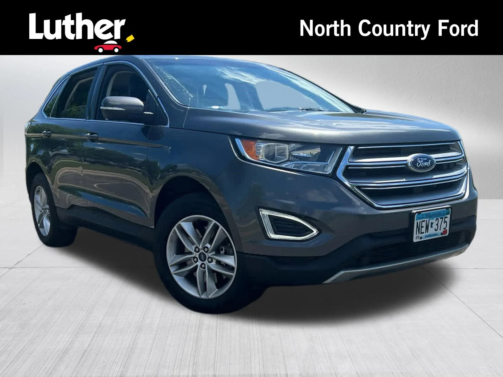 Used 2015 Magnetic Metallic Ford SEL image 1