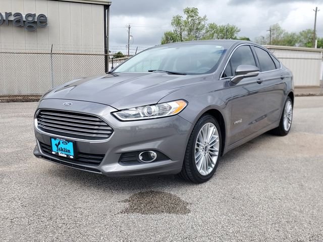 Used 2014 Ford Fusion SE Hybrid with VIN 3FA6P0LU5ER240873 for sale in Richwood, TX