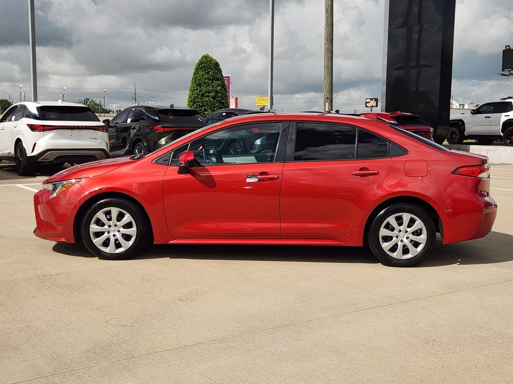Used 2020 Barcelona Red Metallic Toyota LE image 4