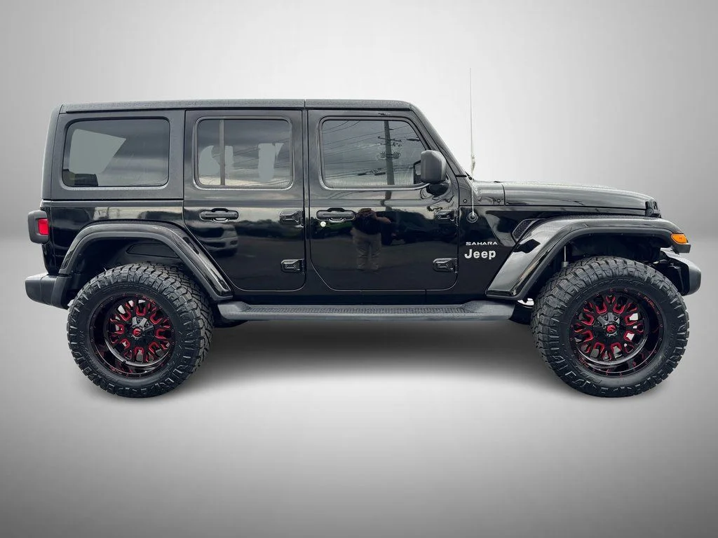 Used 2020 Black Jeep Unlimited Sahara image 6