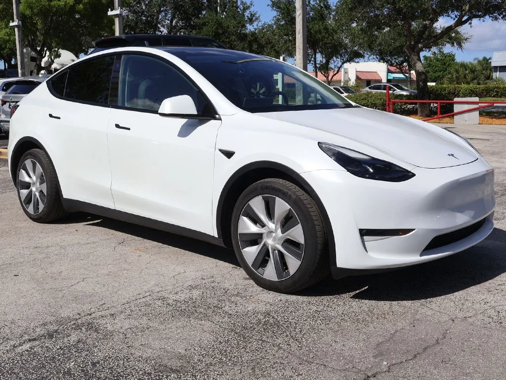 Used 2023 Tesla Model Y Long Range with VIN 7SAYGAEE5PF755670 for sale in Miami, FL