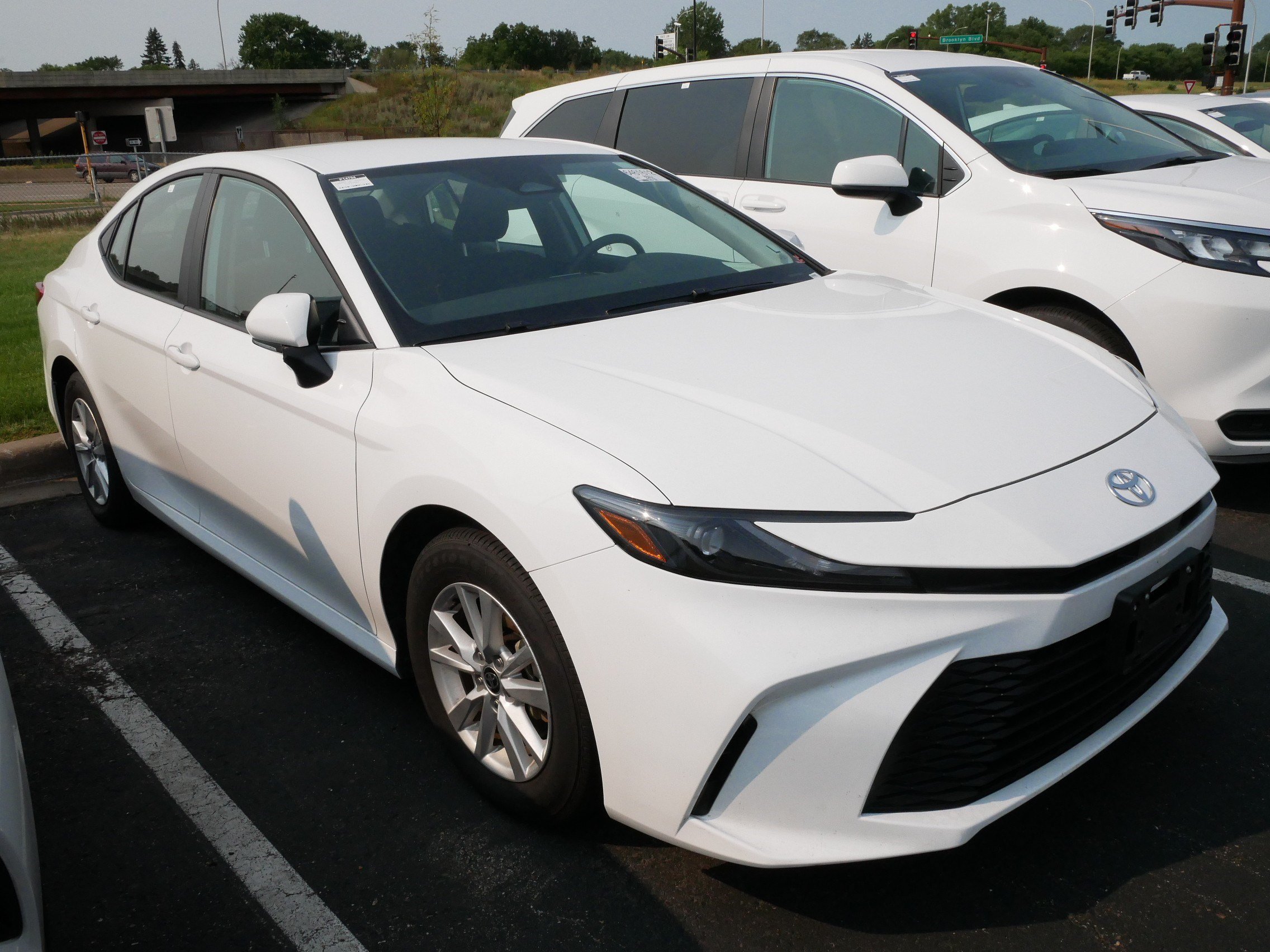 Used 2026 Toyota Camry LE with VIN 4T1DAACKXTU727947 for sale in Brooklyn Center, Minnesota