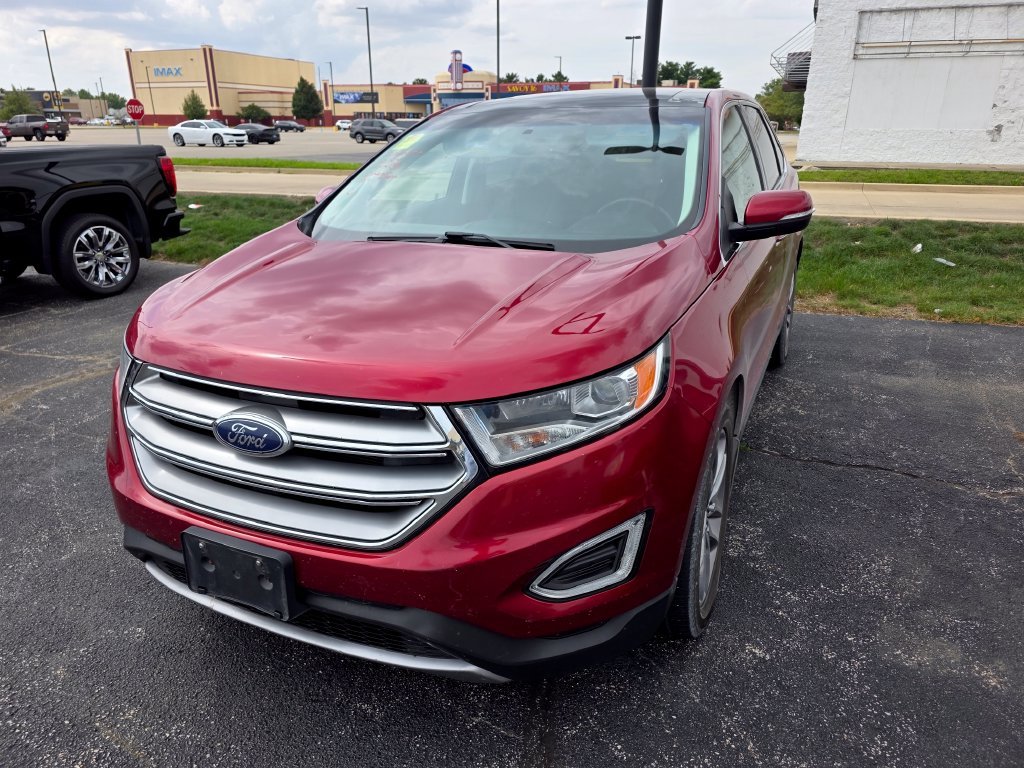 Used 2015 Ruby Red Metallic Ford Titanium image 2