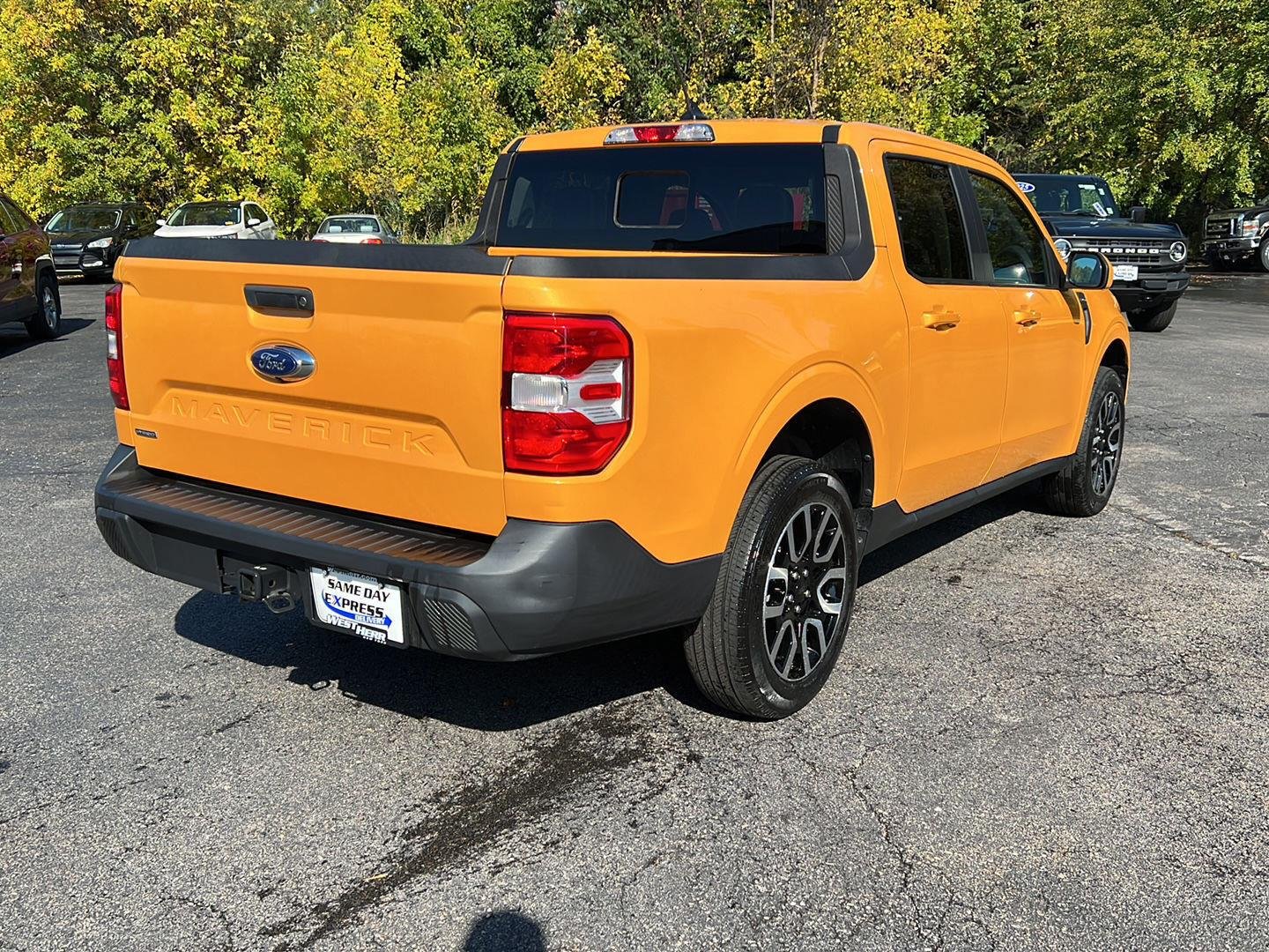 Used 2023 Cyber Orange Metallic Tri-Coat Ford LARIAT image 24