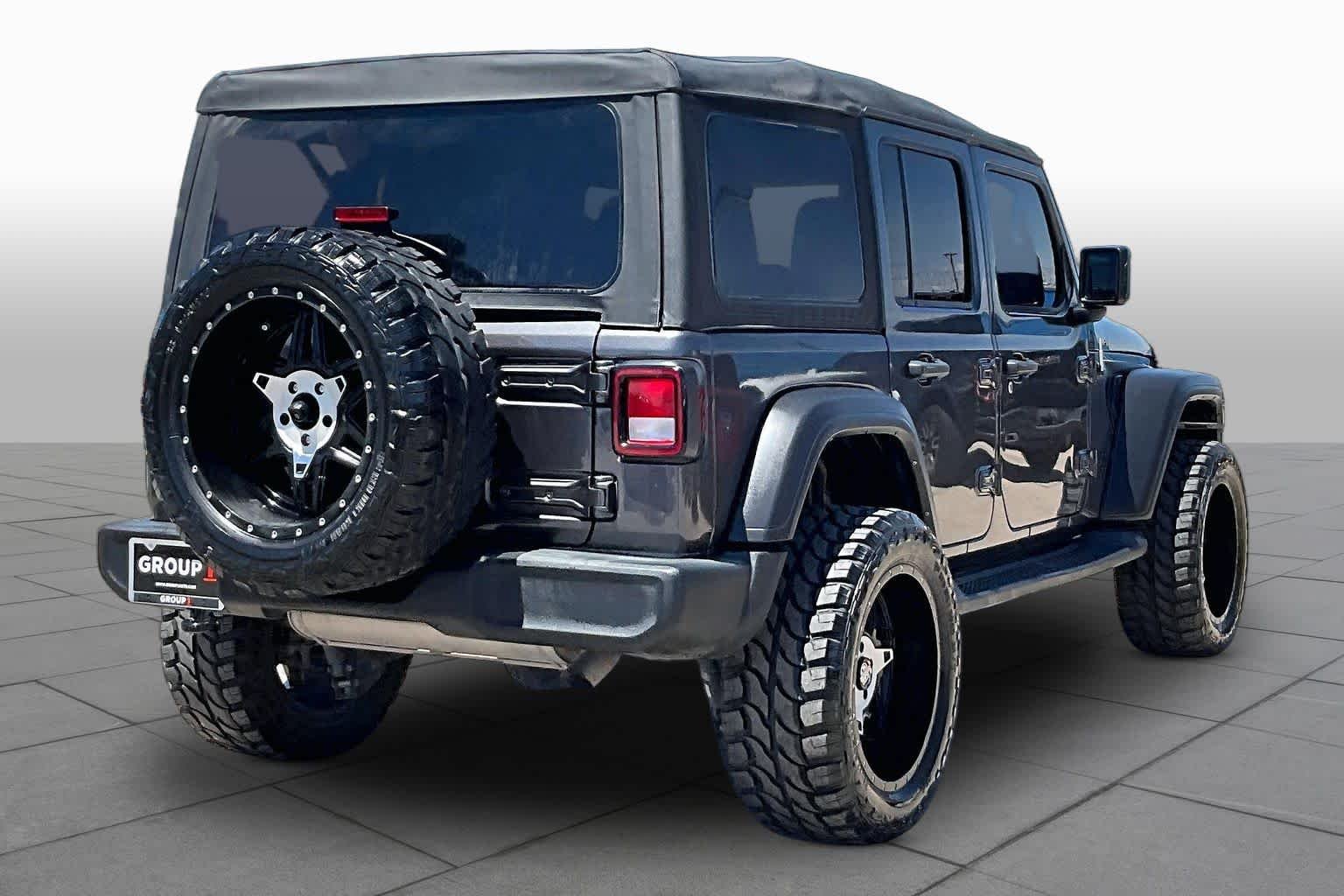 Used 2022 Granite Crystal Clearcoat Metallic Jeep Unlimited Sport S image 12