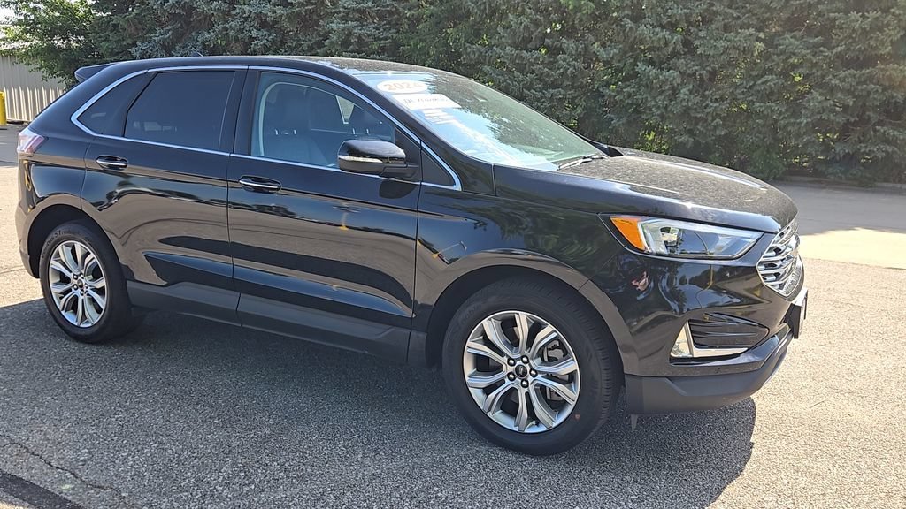 Used 2024 Black Metallic Ford Titanium image 2