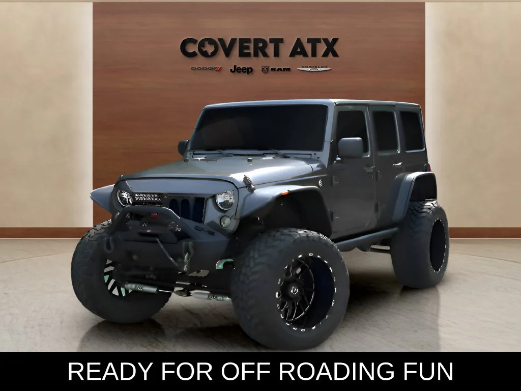 Used 2018 Gray Jeep Unlimited Sport image 1