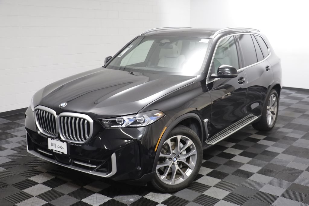 Certified Used 2026 Black Sapphire Metallic BMW xDrive40i image 2