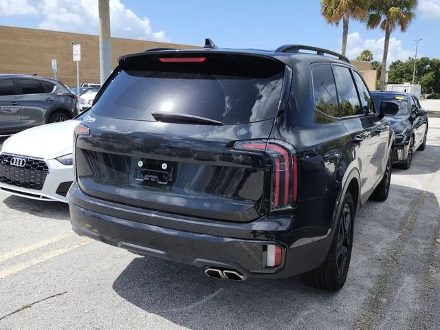 Used 2025 Black Kia EX X-Line image 7