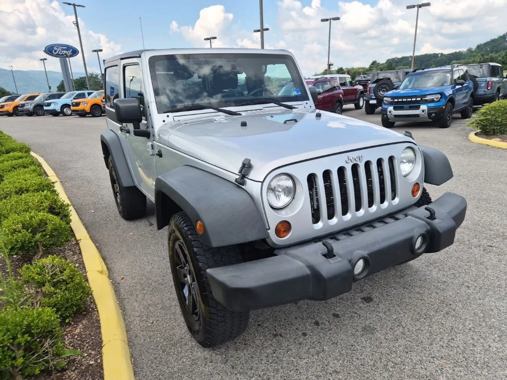 Used 2012 Bright Silver Metallic Jeep Sport image 4