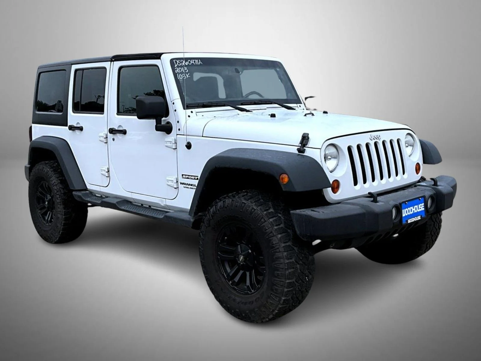 Used 2013 White Jeep Unlimited Sport image 3