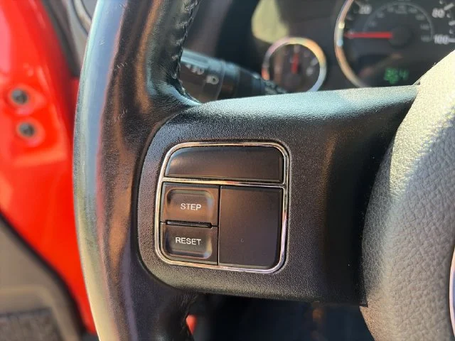 Used 2015 Orange Jeep Unlimited Sport image 19