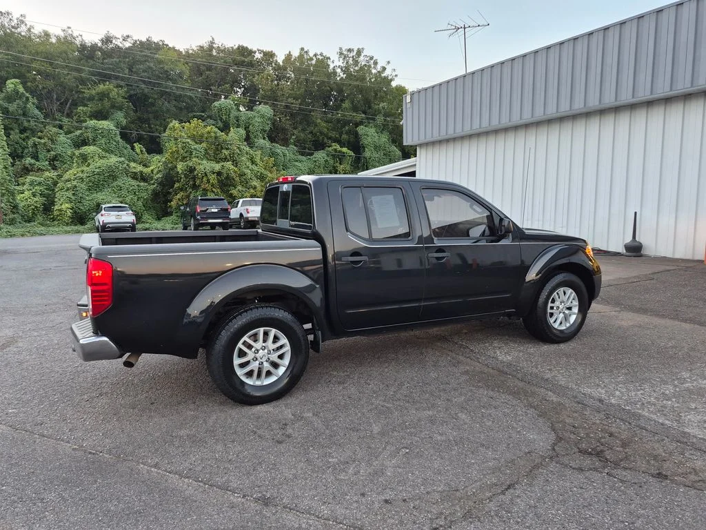 Used 2016 Magnetic Black Nissan SV image 4