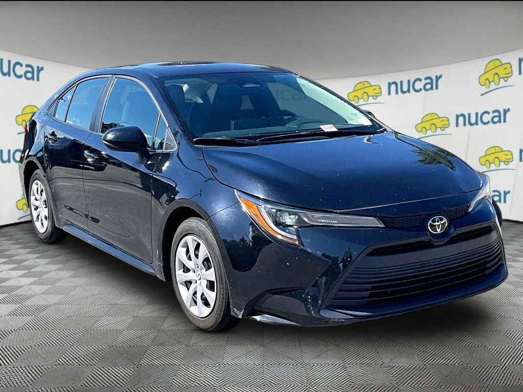 Used 2024 Black Toyota LE image 1