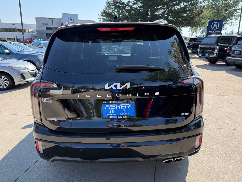 Used 2024 Ebony Black Kia EX X-Line image 5