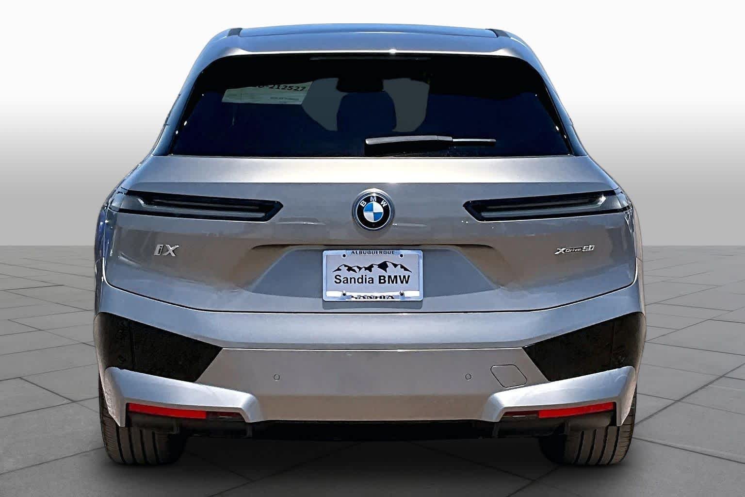 Used 2024 Oxide Grey Metallic BMW xDrive50 image 4