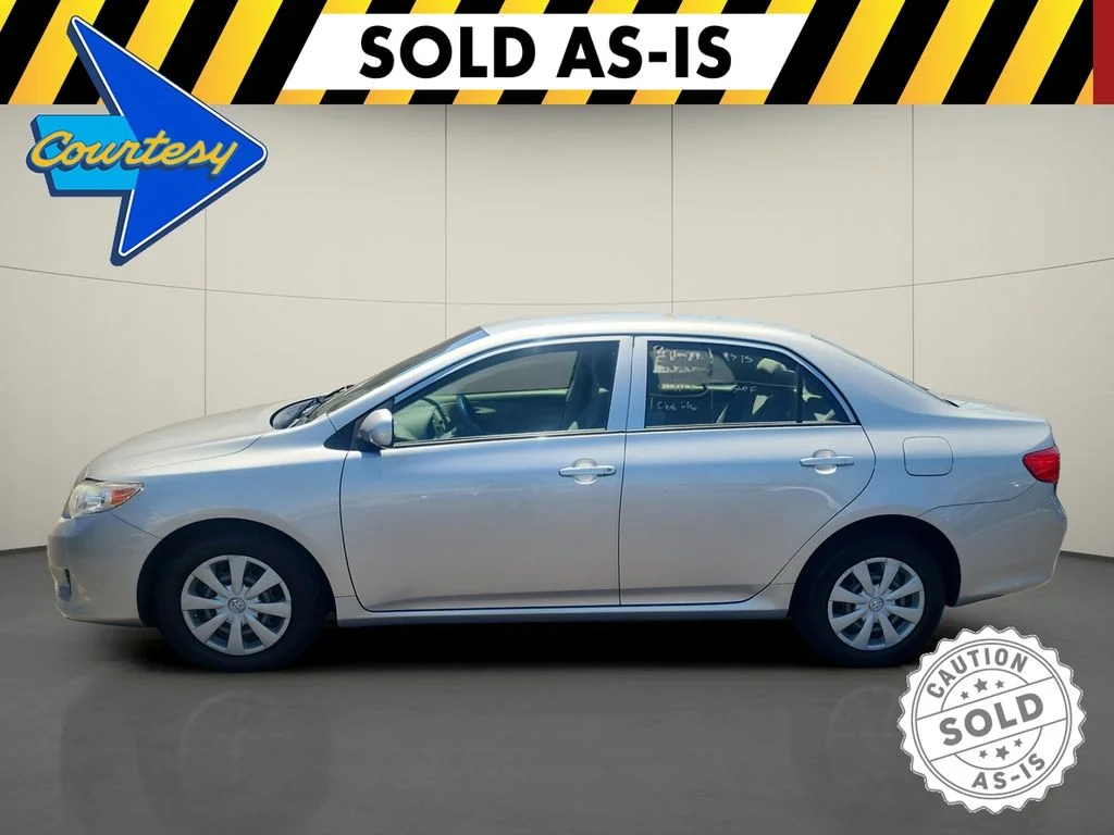 Used 2010 Classic Silver Metallic Toyota LE image 4