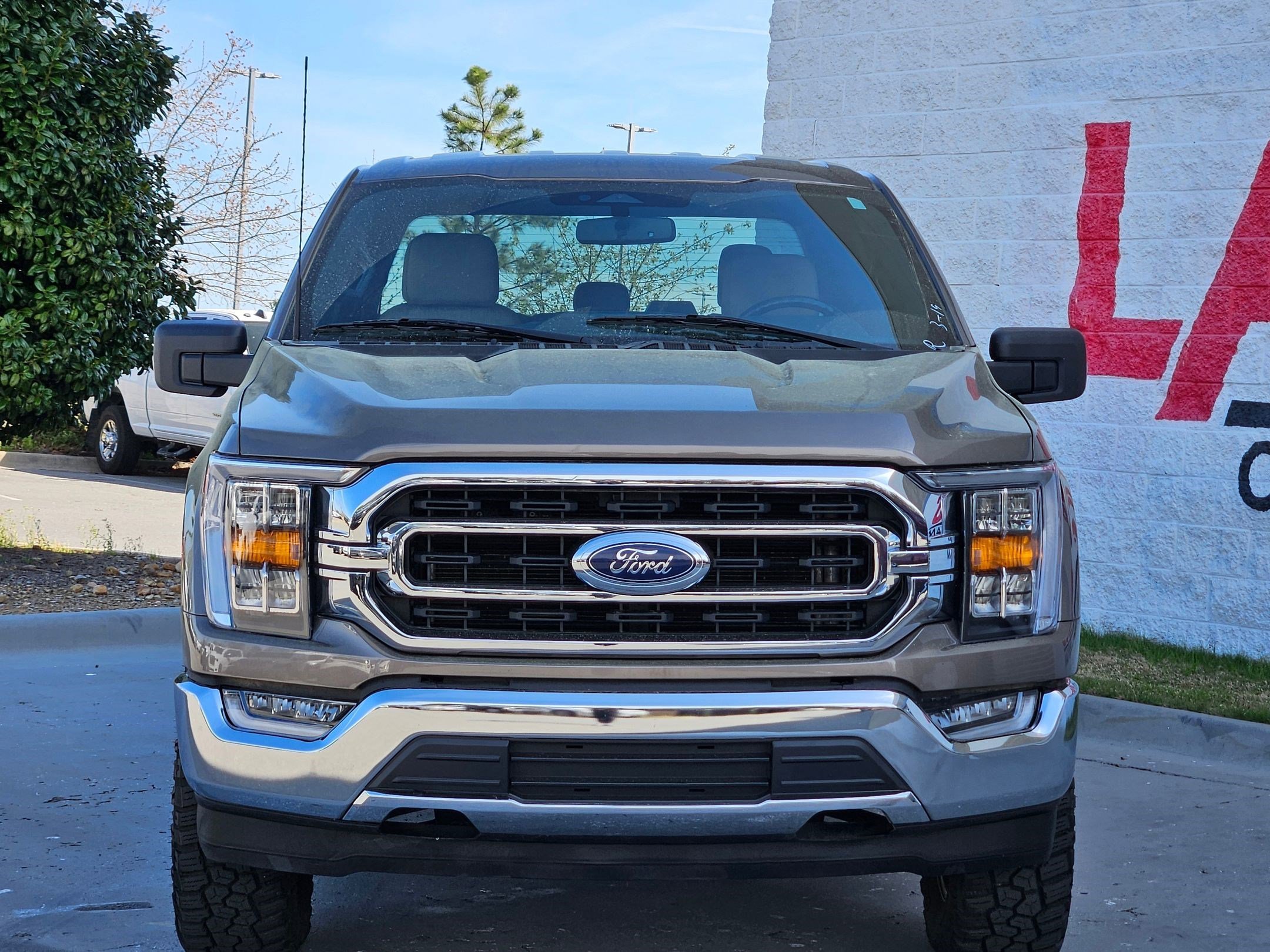 Used 2023 Ford F-150 XLT with VIN 1FTFW1E55PFB28048 for sale in Little Rock