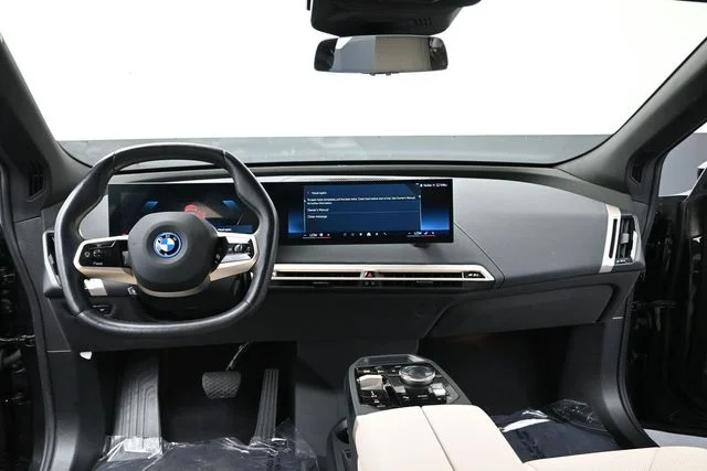 Used 2024 Black Sapphire Metallic BMW xDrive50 image 17