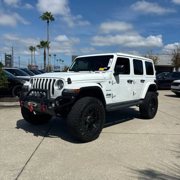 Used 2021 White Jeep Unlimited Sahara image 1