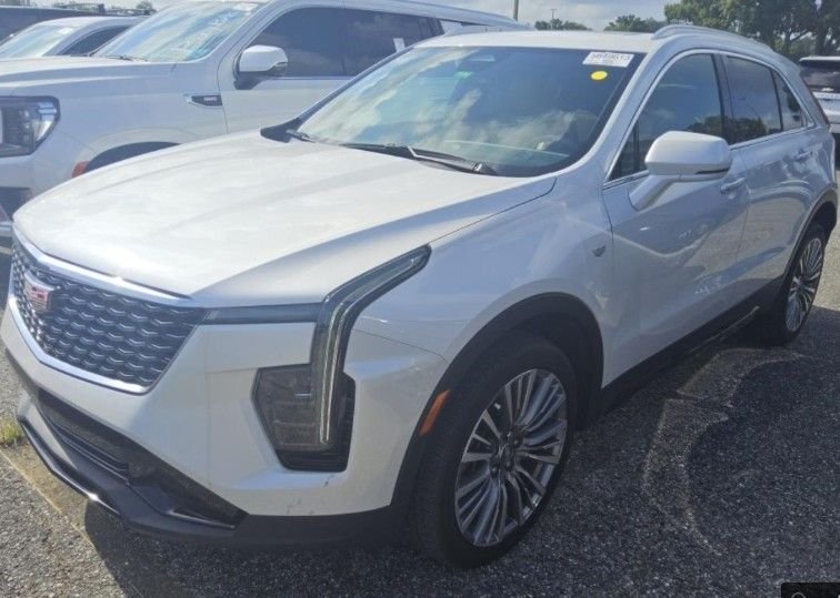 Used 2024 White Cadillac Premium Luxury image 1