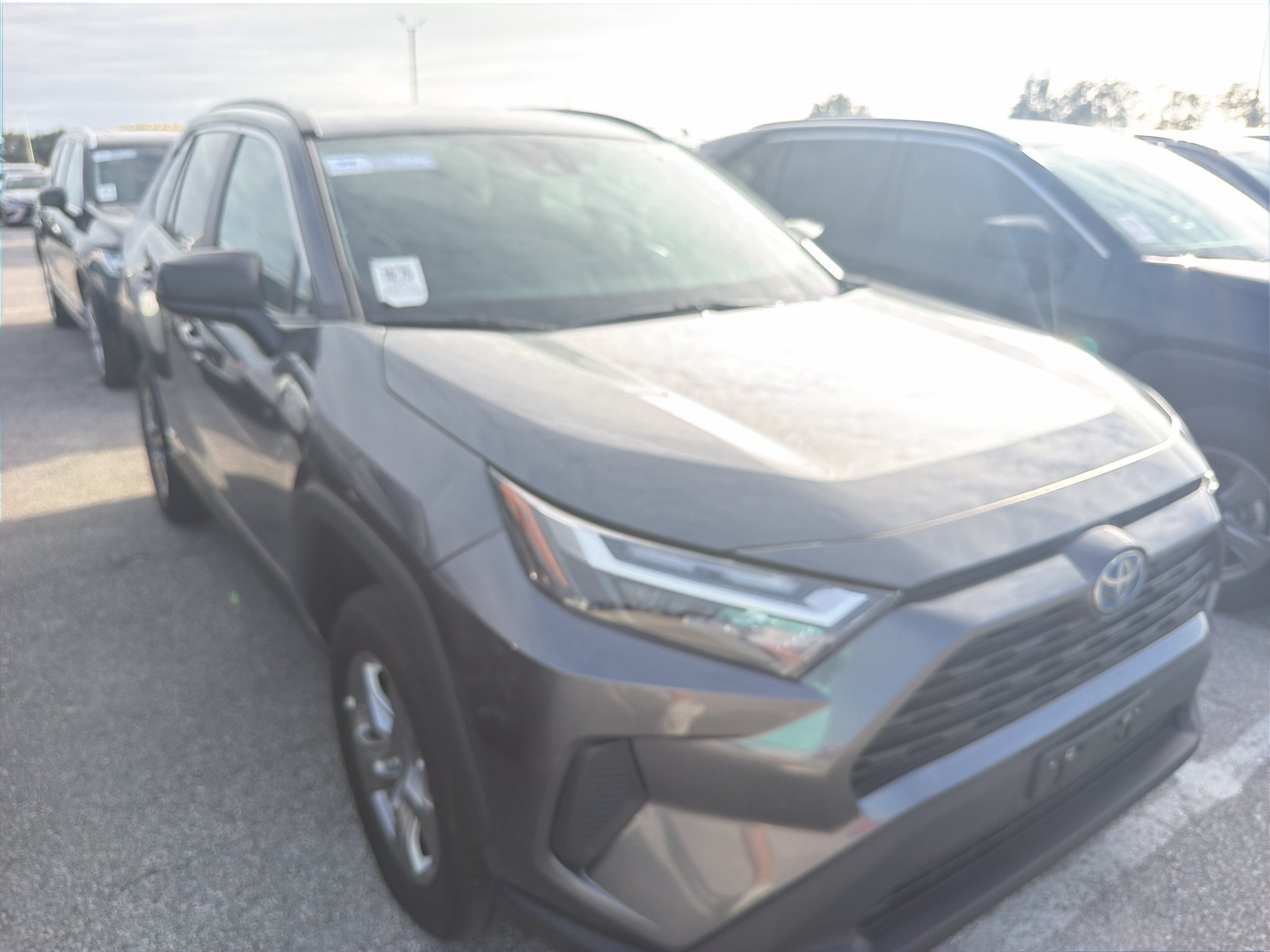 Used 2024 Magnetic Gray Metallic Toyota Hybrid LE image 2