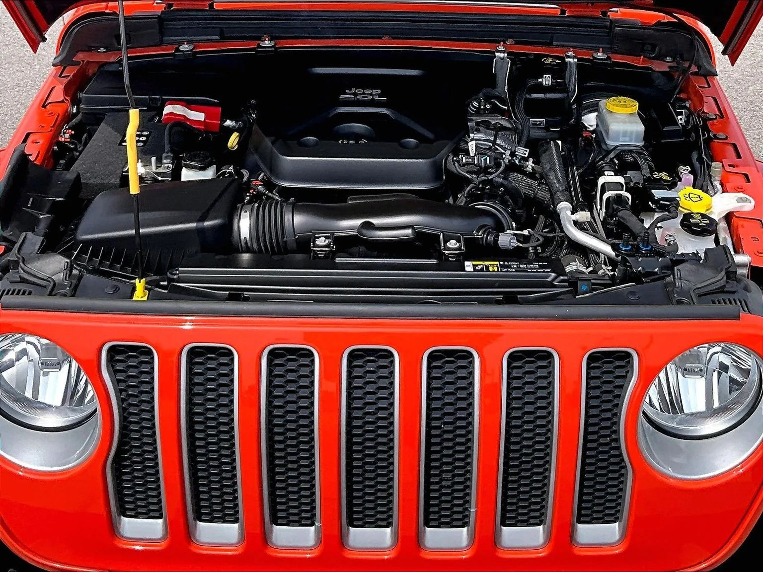 Used 2018 Orange Jeep Unlimited Sahara image 11