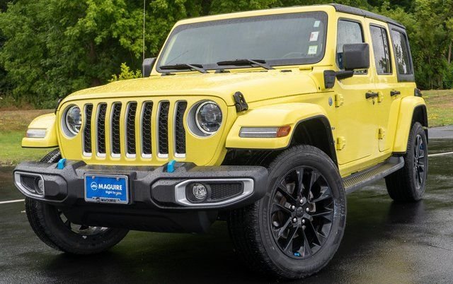 Used 2023 Yellow Jeep Sahara 4xe image 1