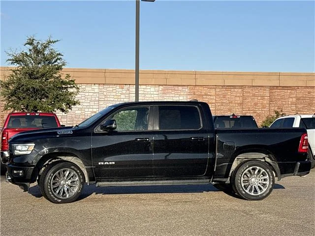 Used 2024 Diamond Black Crystal Pearlcoat RAM Laramie 4x4 Crew Cab 144.5 in. WB image 4