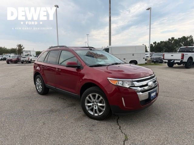 Used 2013 Red Metallic Ford SEL image 1