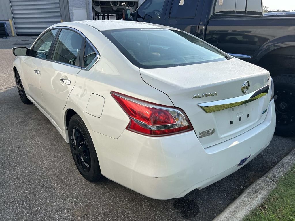 Used 2013 Pearl White Metallic Nissan 2.5 S image 5