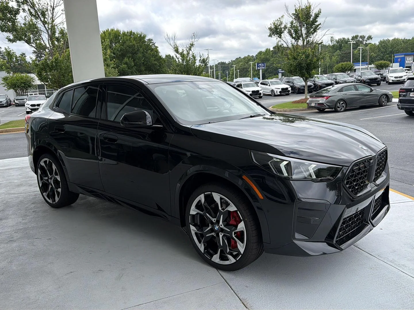 New 2026 Black Sapphire Metallic BMW xDrive28i image 8