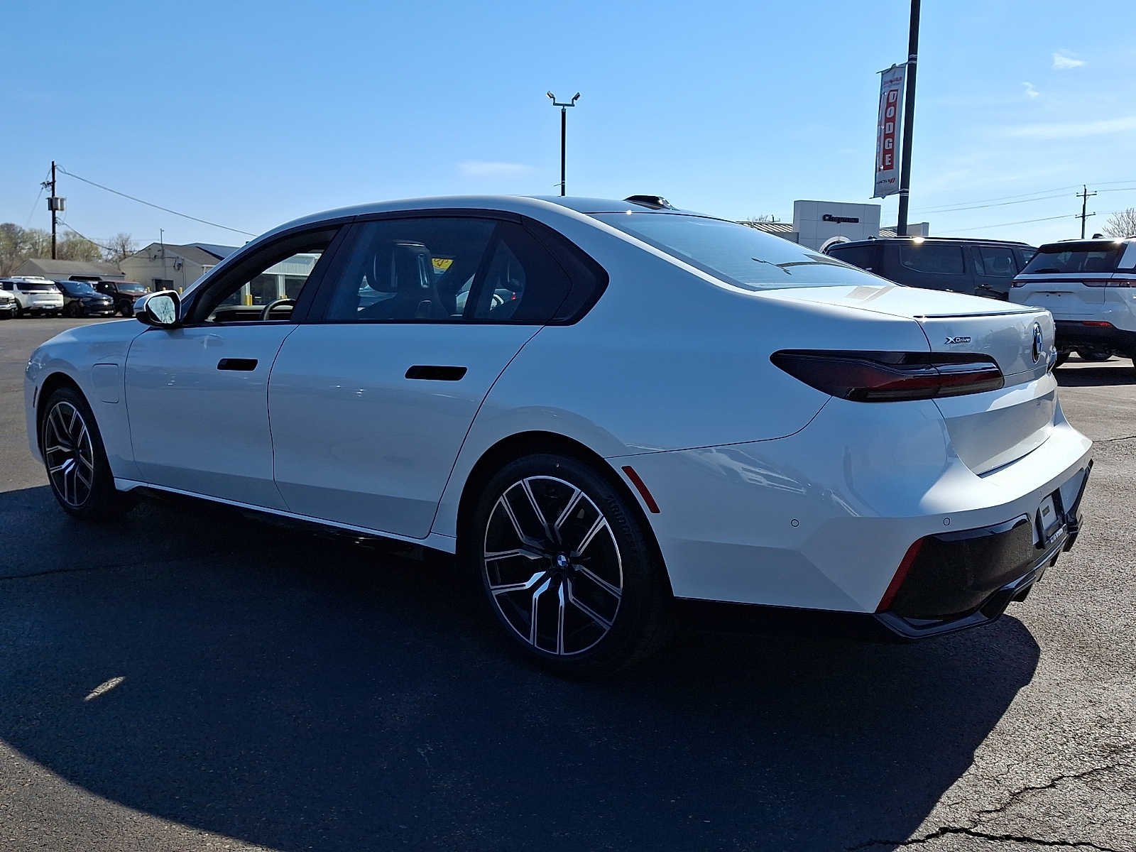 Used 2025 Mineral White Metallic BMW 750e xDrive image 4