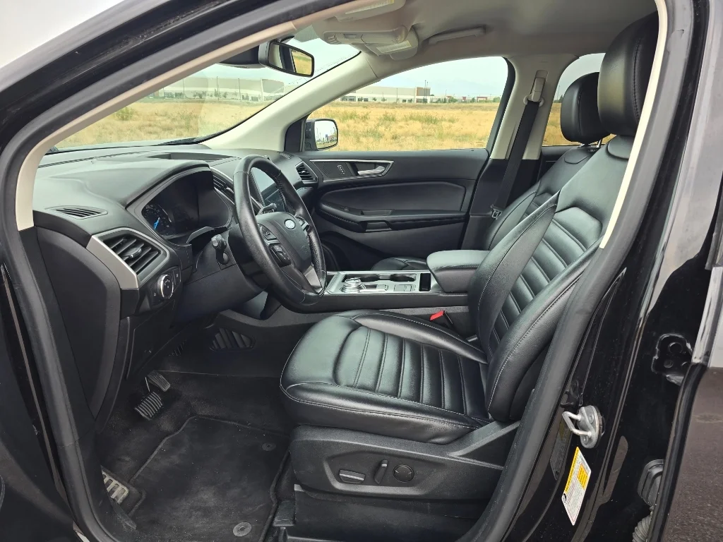 Used 2022 Agate Black Metallic Ford SEL image 12